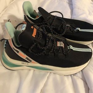 Never worn Puma sneakers. Tag still on size 8 women’s